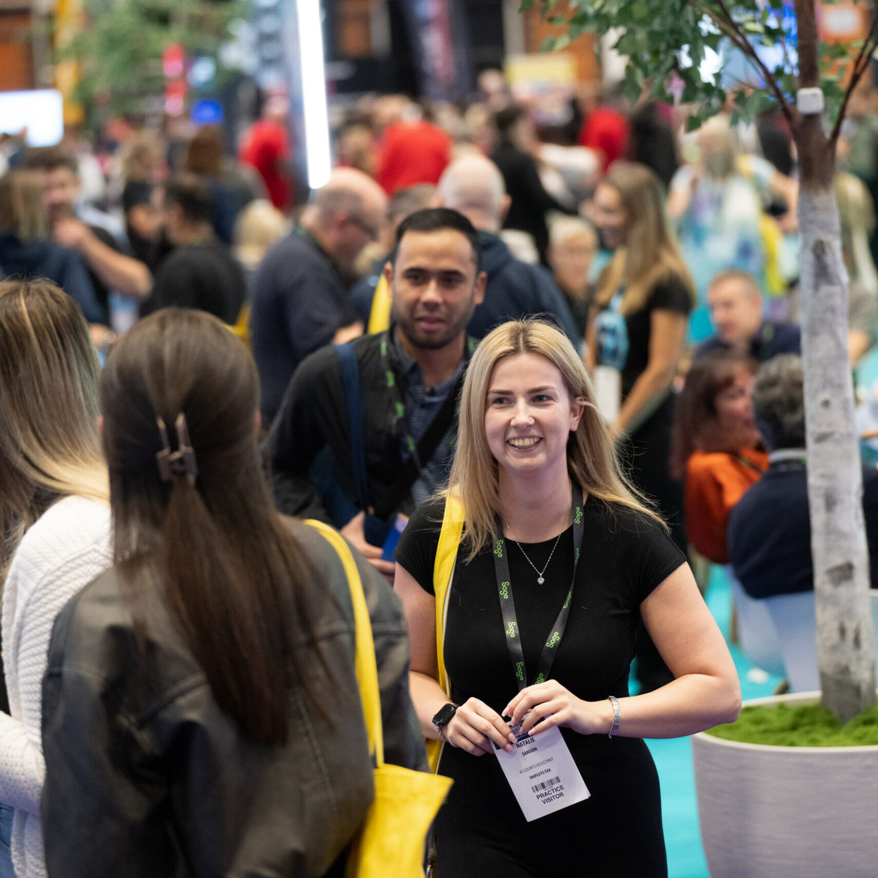 Image of happy visitors at accountex